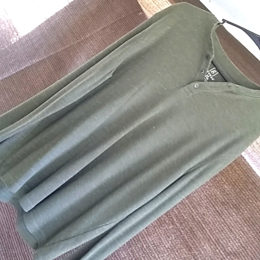 Henley warm pullover with three button neck.